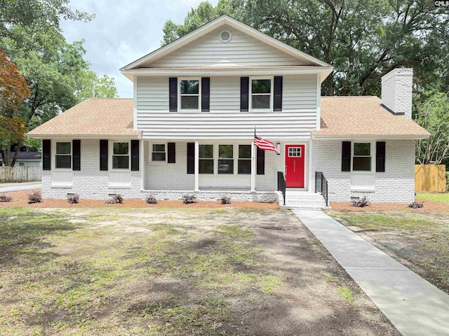 1341 Sanford Rd, Columbia, SC 29206 - traditional-style house featuring brick siding, a chimney, and a shingled roof