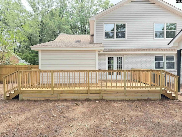 1341 Sanford Rd, Columbia, SC 29206 - back of house featuring a wooden deck, french doors, brick siding, and roof with shingles