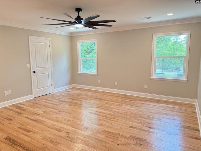 1341 Sanford Rd, Columbia, SC 29206 - spare room featuring light wood-style floors, crown molding, a ceiling fan, and recessed lighting