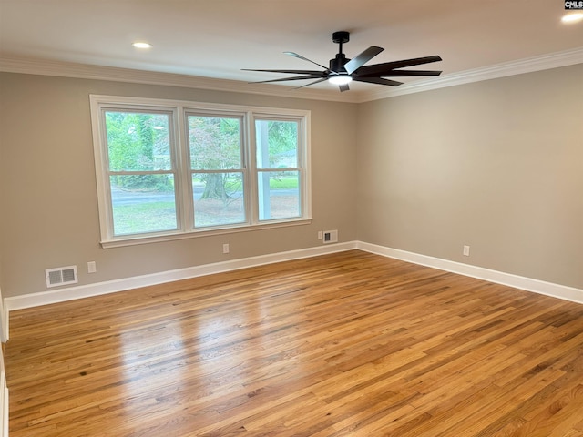 1341 Sanford Rd, Columbia, SC 29206 - spare room featuring light wood-type flooring, crown molding, ceiling fan, and recessed lighting