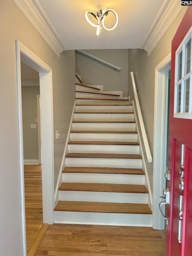 1341 Sanford Rd, Columbia, SC 29206 - stairs with crown molding and wood finished floors