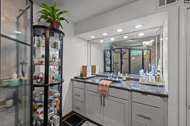 110 Summerlea Dr, Columbia, SC 29203 - full bathroom with vanity, a shower stall, and tile patterned flooring