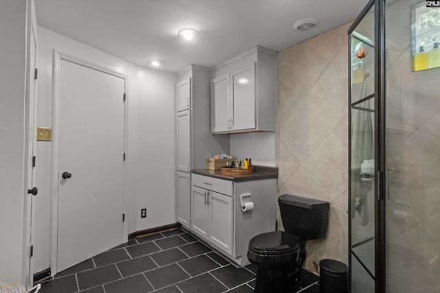 110 Summerlea Dr, Columbia, SC 29203 - bathroom with tile patterned floors and a shower stall