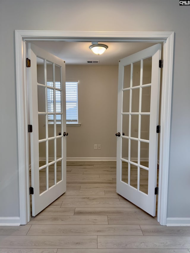 15 Runelle Ln, Columbia, SC 29229 - spare room with wood finished floors and french doors