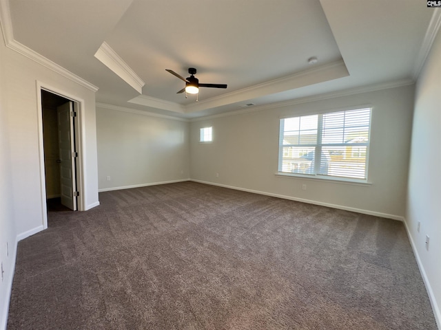 15 Runelle Ln, Columbia, SC 29229 - unfurnished room with a tray ceiling, ceiling fan, dark carpet, and crown molding