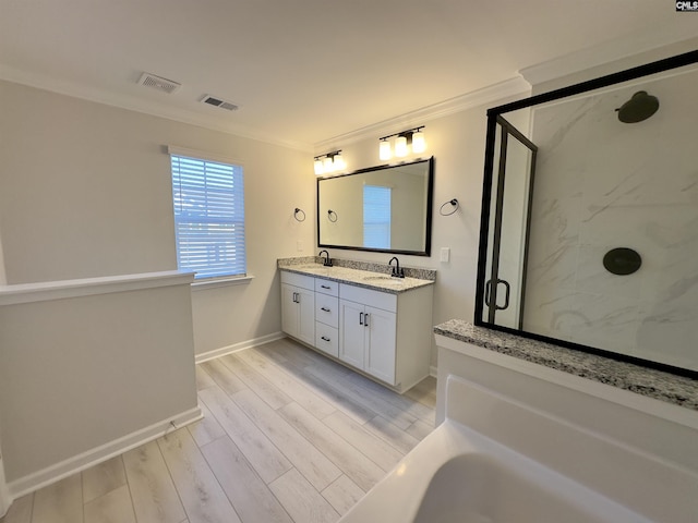 15 Runelle Ln, Columbia, SC 29229 - bathroom with crown molding, double vanity, a marble finish shower, wood finished floors, and a tub to relax in