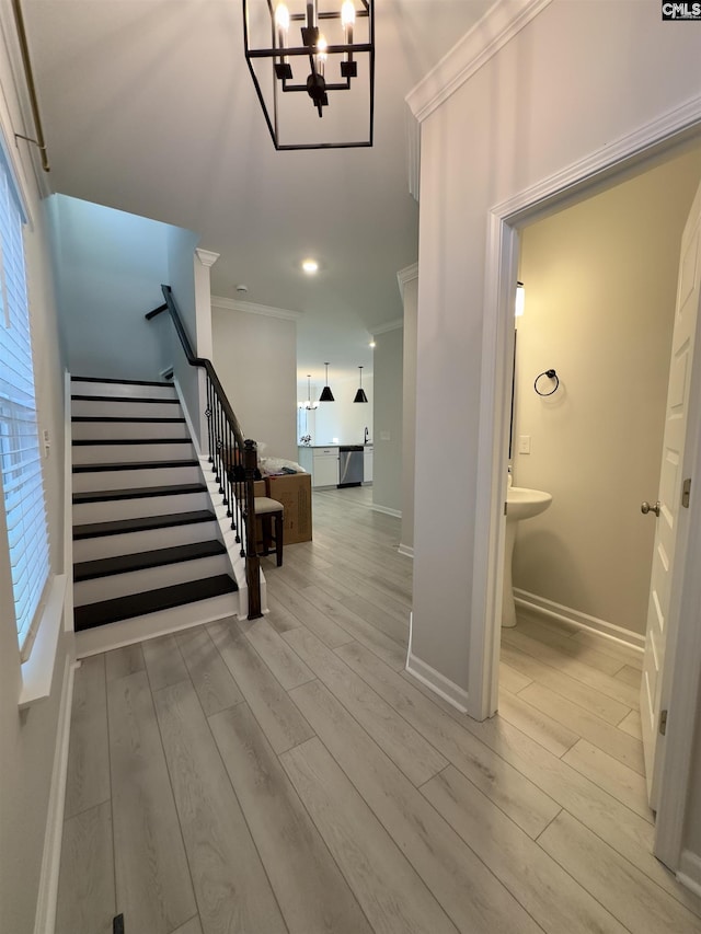 15 Runelle Ln, Columbia, SC 29229 - stairs with crown molding, wood finished floors, and a chandelier