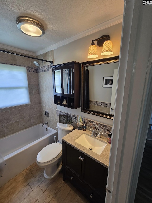 704 Cambridge, Lugoff, SC 29078 - full bathroom featuring a textured ceiling, vanity, bathtub / shower combination, ornamental molding, and backsplash