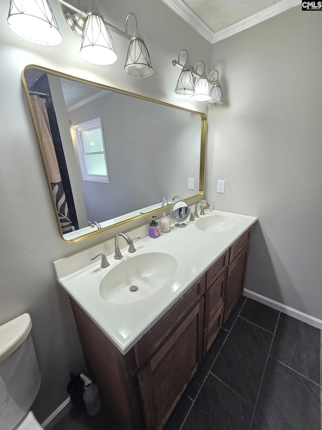 704 Cambridge, Lugoff, SC 29078 - bathroom featuring crown molding, double vanity, and tile patterned floors