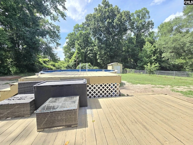 704 Cambridge, Lugoff, SC 29078 - deck featuring a storage unit and view of wooded area