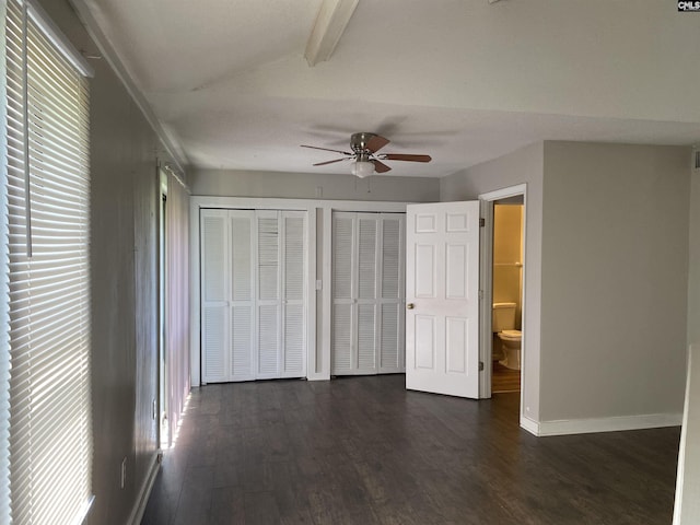 361 Hickory Hill Dr, Columbia, SC 29210 - unfurnished bedroom with dark wood finished floors, two closets, and ceiling fan