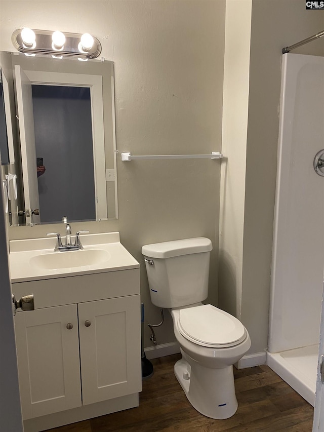 361 Hickory Hill Dr, Columbia, SC 29210 - full bathroom featuring a stall shower, vanity, and wood finished floors