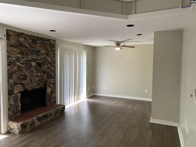 361 Hickory Hill Dr, Columbia, SC 29210 - unfurnished living room with a ceiling fan, dark wood-style floors, a textured ceiling, and a fireplace