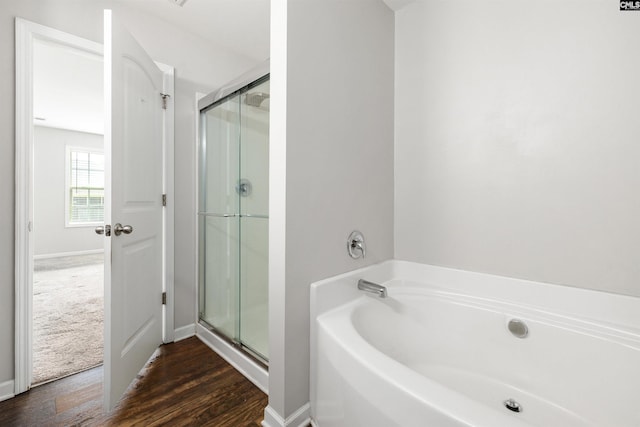 331 Aberlour Dr, Sumter, SC 29154 - bathroom with a shower stall, a garden tub, and wood finished floors