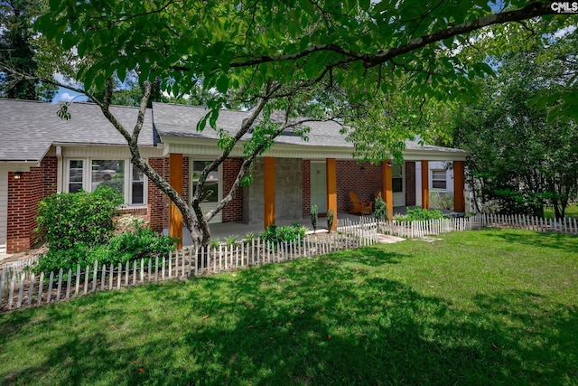 39 Downing, Columbia, SC 29209 - view of front of property with brick siding, covered porch, and a shingled roof