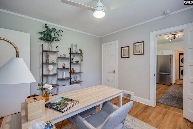 39 Downing, Columbia, SC 29209 - office space with stacked washer / drying machine, ceiling fan, light wood-type flooring, and ornamental molding