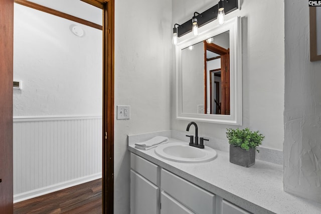 301 Colony Hill Rd, Lexington, SC 29072 - bathroom with vanity, wood finished floors, and wainscoting