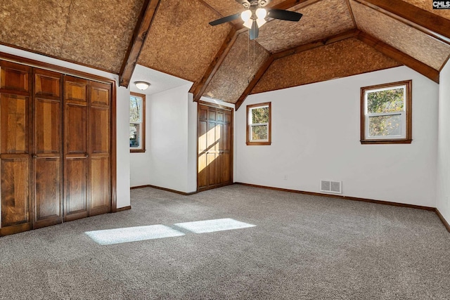 301 Colony Hill Rd, Lexington, SC 29072 - unfurnished bedroom featuring carpet floors, vaulted ceiling, and a ceiling fan