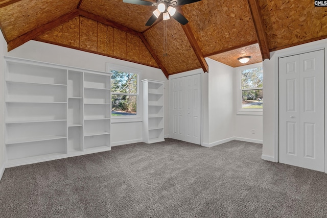 301 Colony Hill Rd, Lexington, SC 29072 - unfurnished bedroom with two closets, vaulted ceiling, carpet flooring, and a ceiling fan
