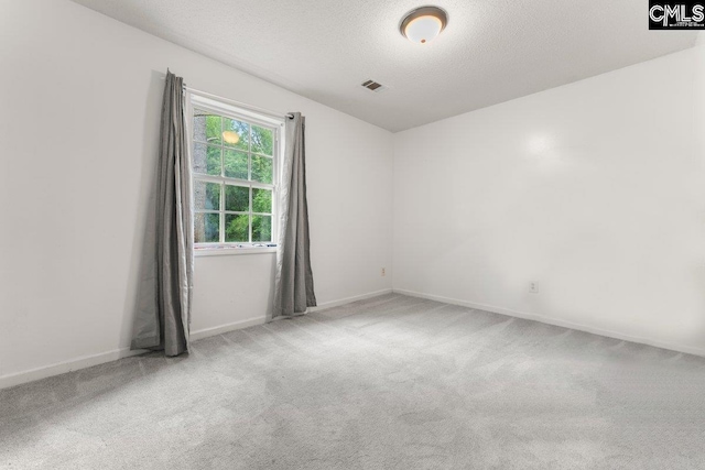 2027 Tucker Rd, Hopkins, SC 29061 - unfurnished room with carpet floors and a textured ceiling
