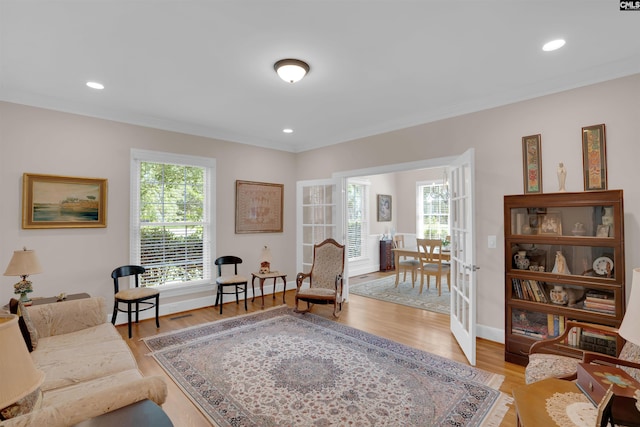 8 Sand Spur Rd, Columbia, SC 29223 - living room featuring plenty of natural light, light wood finished floors, crown molding, and recessed lighting