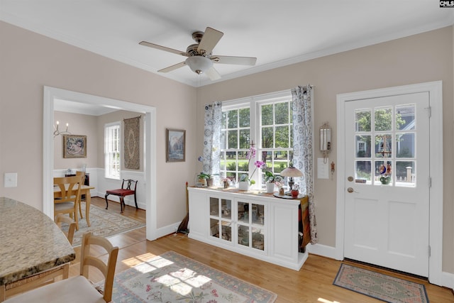 8 Sand Spur Rd, Columbia, SC 29223 - entrance foyer with healthy amount of natural light, light wood-style floors, ceiling fan, and crown molding