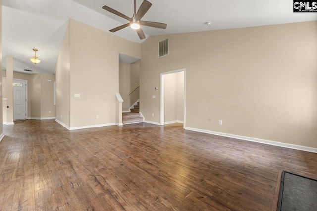 422 Drooping Leaf Rd, Lexington, SC 29072 - unfurnished living room with ceiling fan, stairs, wood finished floors, and high vaulted ceiling