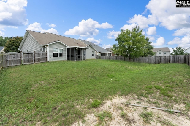 422 Drooping Leaf Rd, Lexington, SC 29072 - fenced backyard featuring a sunroom