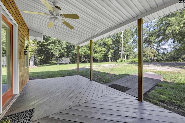 159 Rogers Rd, Saluda, SC 29138 - wooden terrace with a trampoline, ceiling fan, a lawn, and view of scattered trees