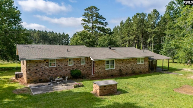 159 Rogers Rd, Saluda, SC 29138 - back of property featuring crawl space, a lawn, a patio area, and brick siding