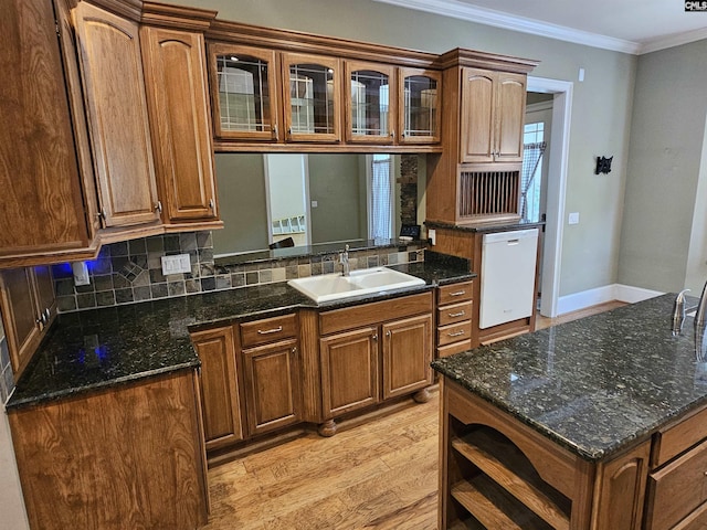 116 Avington Ln, Columbia, SC 29229 - kitchen with white dishwasher, decorative backsplash, glass insert cabinets, open shelves, and dark stone counters