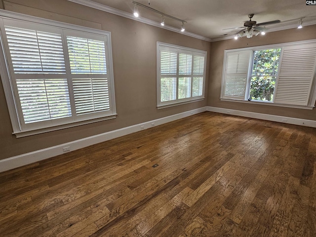 116 Avington Ln, Columbia, SC 29229 - spare room featuring rail lighting, crown molding, dark wood-style flooring, and ceiling fan