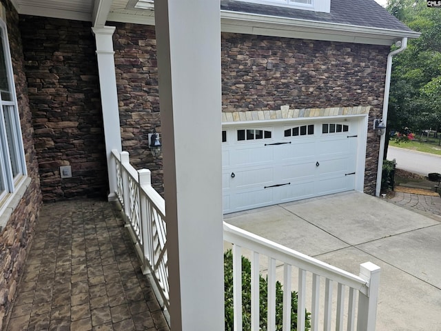 116 Avington Ln, Columbia, SC 29229 - garage featuring concrete driveway and a porch