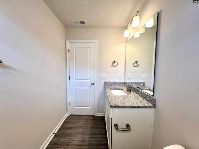 1958 Castlerock Dr, Sumter, SC 29153 - bathroom with vanity and wood finished floors