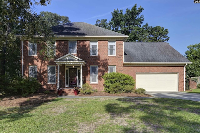 430 Hampton Creek Ct, Columbia, SC 29209 - colonial inspired home featuring a front lawn, driveway, an attached garage, and brick siding