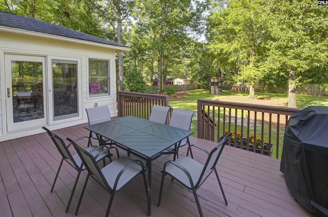 430 Hampton Creek Ct, Columbia, SC 29209 - deck featuring outdoor dining area, a fenced backyard, grilling area, and view of wooded area