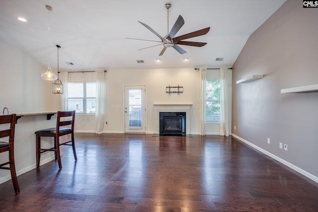 22 Kentucky Derby Ct, Lugoff, SC 29078 - unfurnished living room featuring ceiling fan, dark wood finished floors, a fireplace with flush hearth, recessed lighting, and vaulted ceiling