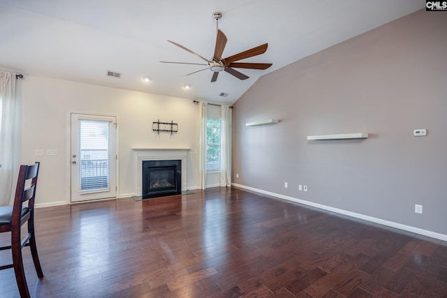 22 Kentucky Derby Ct, Lugoff, SC 29078 - unfurnished living room with a ceiling fan, healthy amount of natural light, lofted ceiling, a glass covered fireplace, and wood finished floors