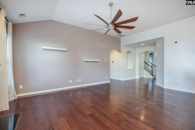 22 Kentucky Derby Ct, Lugoff, SC 29078 - unfurnished living room with arched walkways, ceiling fan, wood finished floors, lofted ceiling, and stairs