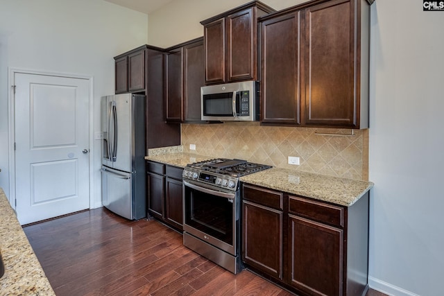 22 Kentucky Derby Ct, Lugoff, SC 29078 - kitchen featuring appliances with stainless steel finishes, dark wood-style floors, decorative backsplash, and dark brown cabinetry