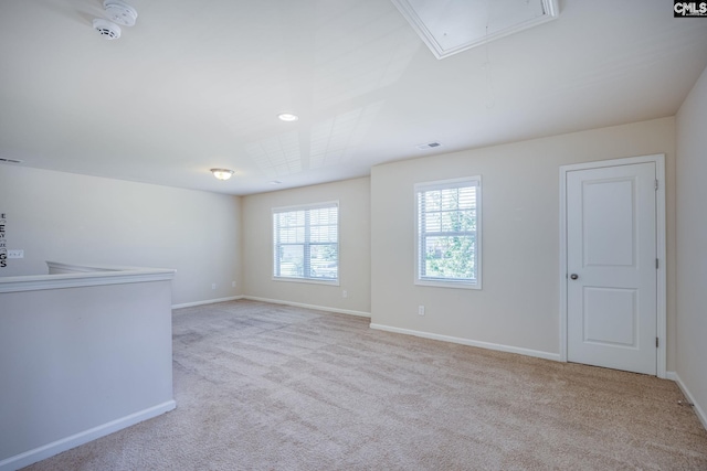 22 Kentucky Derby Ct, Lugoff, SC 29078 - spare room with attic access, light colored carpet, and a smoke detector