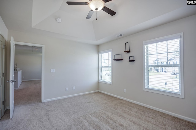 22 Kentucky Derby Ct, Lugoff, SC 29078 - carpeted spare room featuring ceiling fan, a smoke detector, and a tray ceiling