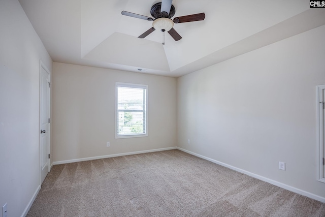 22 Kentucky Derby Ct, Lugoff, SC 29078 - spare room featuring ceiling fan, carpet flooring, and a tray ceiling