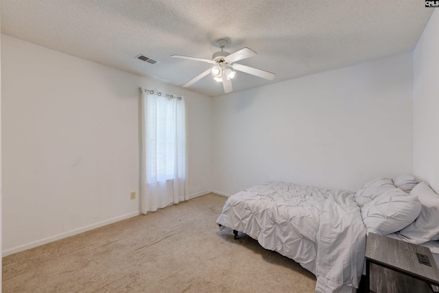 241 Friarsgate Blvd, Irmo, SC 29063 - bedroom featuring light colored carpet, a textured ceiling, and ceiling fan