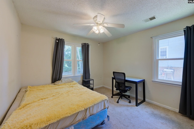 241 Friarsgate Blvd, Irmo, SC 29063 - bedroom with light colored carpet, a textured ceiling, and ceiling fan