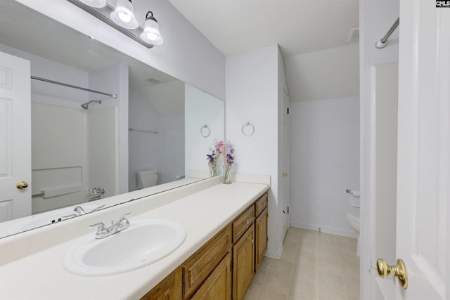 241 Friarsgate Blvd, Irmo, SC 29063 - bathroom featuring vanity, a shower, tile patterned flooring, and lofted ceiling