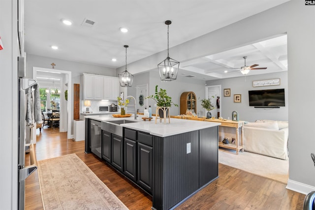 214 Chapin Brook Ct, Chapin, SC 29036 - kitchen featuring stainless steel dishwasher, white cabinetry, open floor plan, a ceiling fan, and recessed lighting