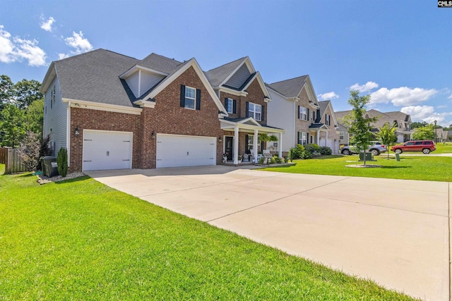 214 Chapin Brook Ct, Chapin, SC 29036 - view of front of house featuring brick siding, driveway, a residential view, a front yard, and an attached garage