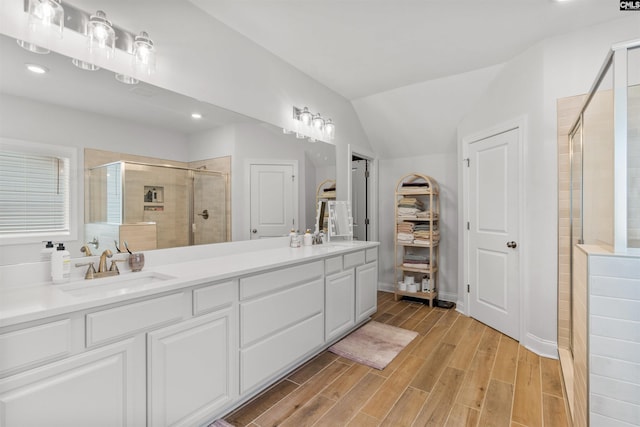 214 Chapin Brook Ct, Chapin, SC 29036 - full bath with a shower stall, double vanity, wood finished floors, recessed lighting, and lofted ceiling