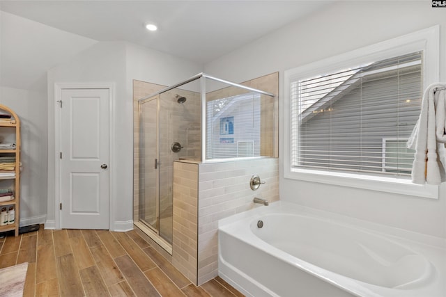 214 Chapin Brook Ct, Chapin, SC 29036 - full bath featuring a garden tub, a shower stall, wood finished floors, and recessed lighting